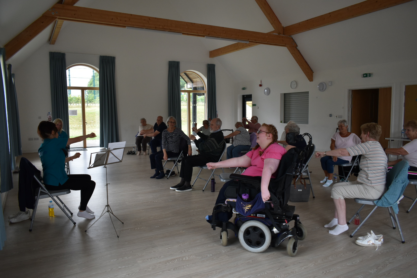 A seated chair exercise class at Hermitage Village Hall in Berkshire