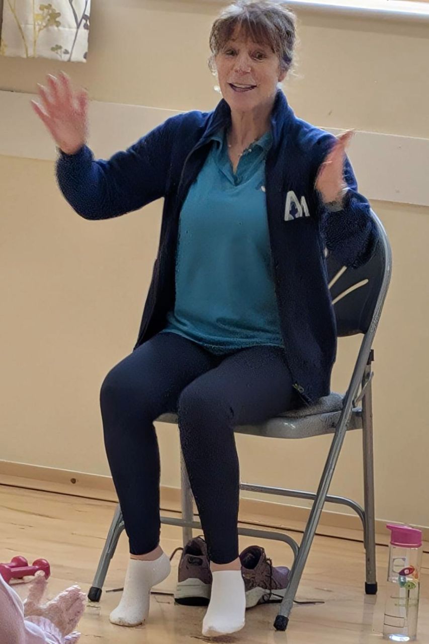 Debbie teaching a MOVEability seated exercise class